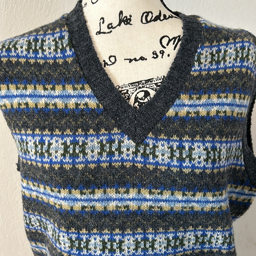 100% Pure new wool Brora v neck sweater vest. Perfect for layering.
